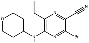 3-bromo-6-etylo-5-((tetrahydro-2H-piran-4-ylo)amino)pirazyno-2-karbonitryl
